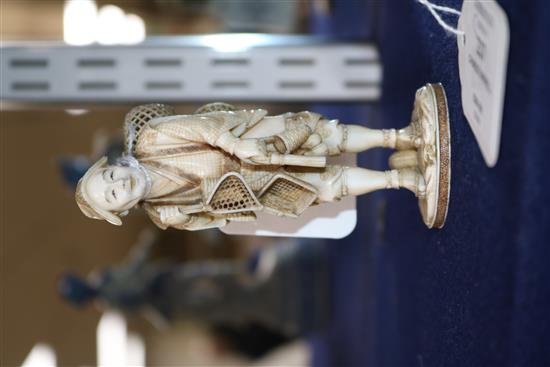 A Japanese ivory basket seller height 11cm